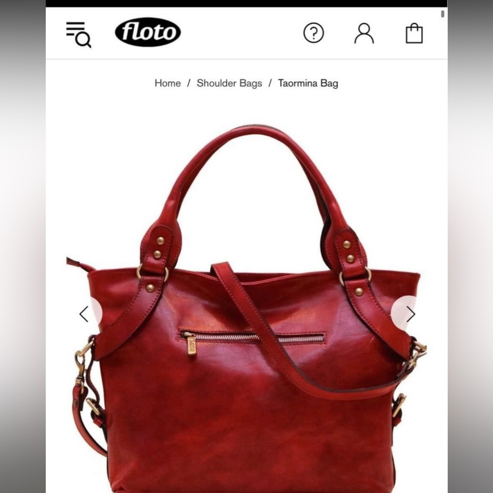 Brand New in box. Red Floto purse, multiple pockets, comes with cross body strap